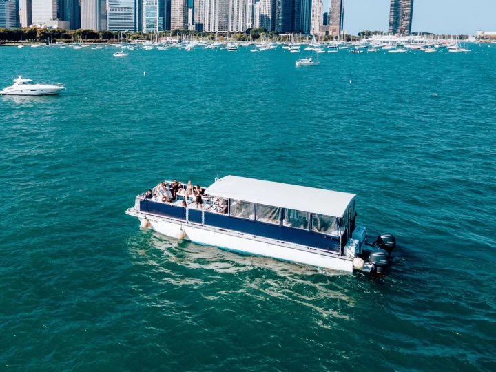 Spacious big boat charter cruising on Lake Michigan with the Chicago skyline in the background