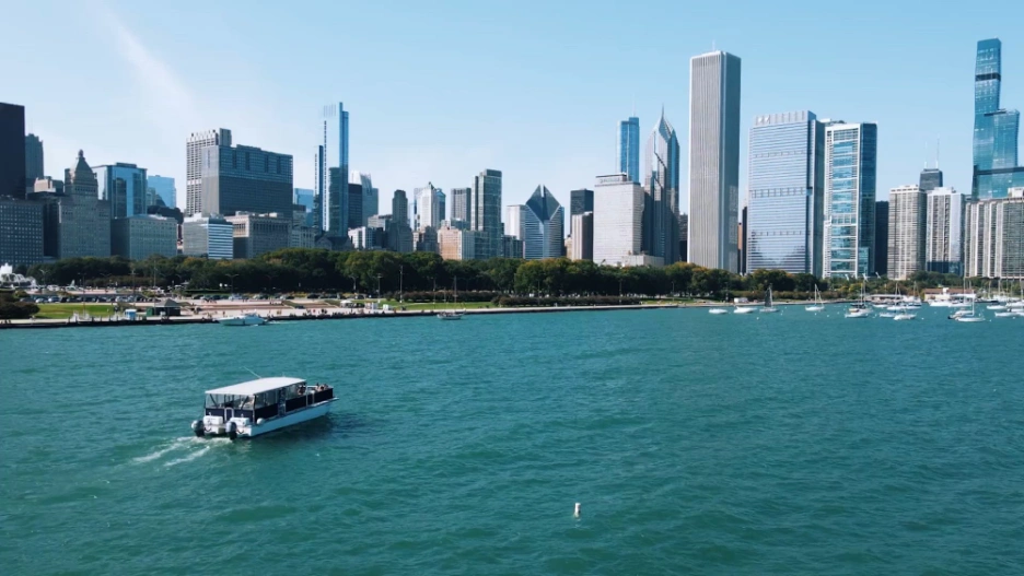 Big boat charter cruising on Lake Michigan with the Chicago skyline