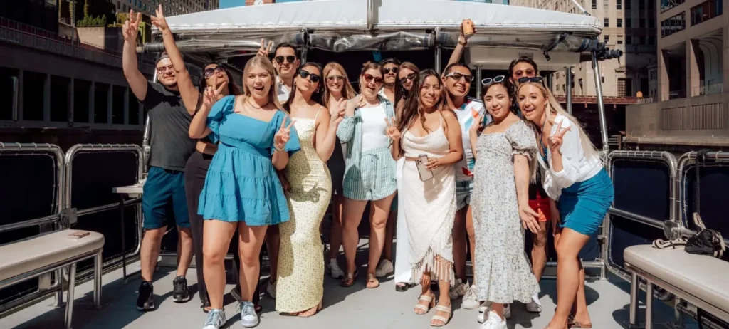 Group celebrating on a private boat charter in downtown Chicago