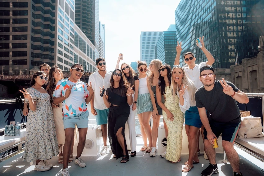 Team celebration on a corporate boat rental in Chicago near downtown.