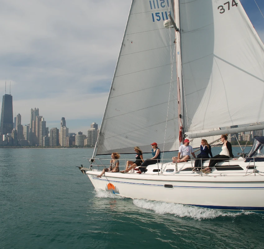 Sailboat rental in Chicago sailing on Lake Michigan with the Chicago skyline