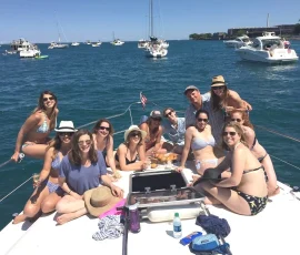 Group enjoying a boat rental at the Chicago Playpen