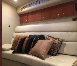 Detailed view of luxury yacht interior seating and wood finishes