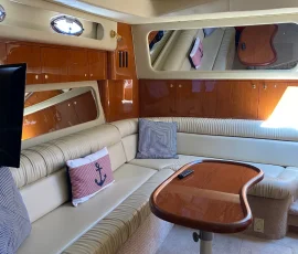 Luxury yacht salon seating area with plush interior furnishings