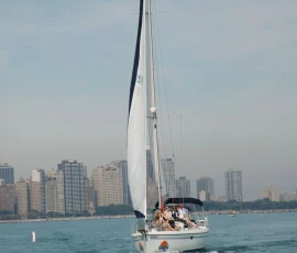 Private sailboat cruising near Chicago Harbor
